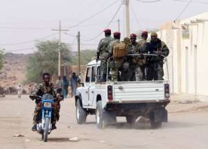 Mali regular army reinforcements patrol Kidal in 2006.  By Kambou Sia AFPFile