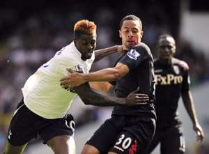 Fulhams Belgian striker Moussa Dembele (R) vies with Tottenham Hotspurs Togolese striker Emmanuel Adebayor.  By Glyn Kirk (AFP/File)