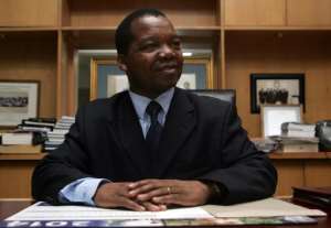 Zimbabwean economist John Mangudya who was appointed central bank governor poses in his office on March 24, 2014 in Harare.  By Jekesai Njikizana AFPFile