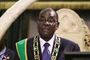 Zimbabwe President Robert Mugabe delivers a speech during the official opening of the third session of the eight parliament in Harare on September 15, 2015.  By Jekesai Njikizana (AFP)