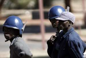 Zimbabwean police patrol in Harare on June 22, 2008.  By Alexander Joe AFPFile