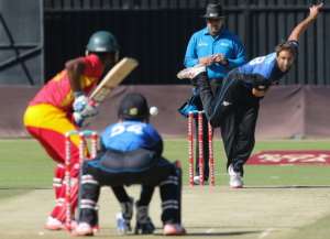 New Zealand bowler Grant Elliot plays a shot during the second game in a series of three One Day International ODI cricket matches between Zimbabwe and New Zealand at Harare Sports Club on August 4, 2015.  By Jekesai Njikizana AFP