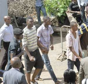 Some of the handcuffed students at the court premises yesterday