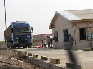 A truck going over the weighing scale