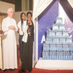 Rev. Father Campbell and Nana Konadu Agyemang Rawlings unveiling Awake
