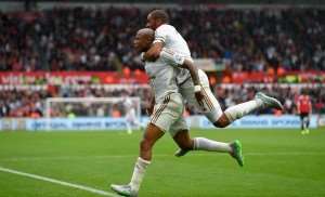 Andre Ayew celebrates one his heroic moments in England