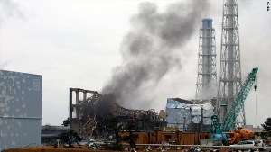 Smoke plumes rise from nuclear reactors
