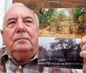 Bert Taylor with a picture of the graveyard where his parents are buried as it is now top and in 1931 bottom. 2387b64