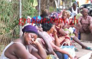 Women waiting anxiously in front of the Accident Centre at the Korle Bu Teaching Hospital