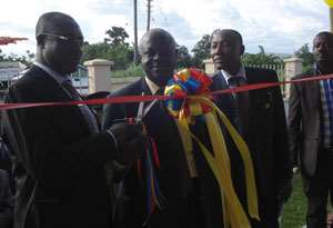 Engineer William Hutton-Mensah cutting the tape to officially open the Bortianor Office