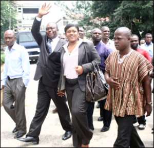 Asamoah-Boateng and wife, Zuleika waving to the crowd
