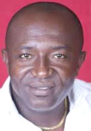 Mr. Edward Ennin, MP for Obuasi