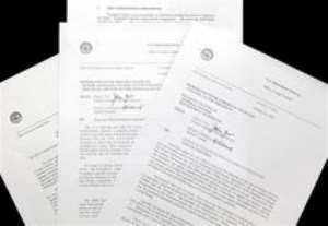 AP – Justice Department memos from 2001 are seen in Washington Monday, March 2, 2009. The Justice Department 