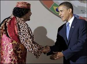 Obama, right and Moammar Gadhafi