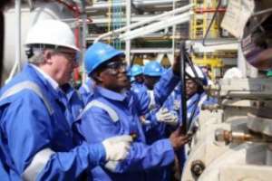 FLASHBACK: President J.E.A. Mills (2nd R) turns the valve to flag off first oil production at FPSO Kwame Nkrumah oil rig at the Jubilee field in Takoradi