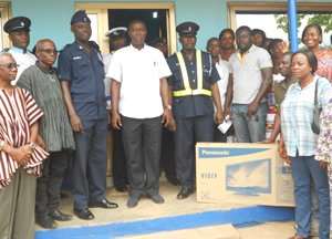 Patrick Yaw Boamah with some Officers at the Tesano District Police
