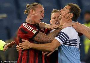 Philippe Mexes sent off for grabbing throat of Lazio players in AC Milan defeat