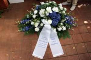 Hamburg presents Condolence Wreath in honor of the Late Mills.