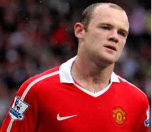 Rooney signs bumper United extension