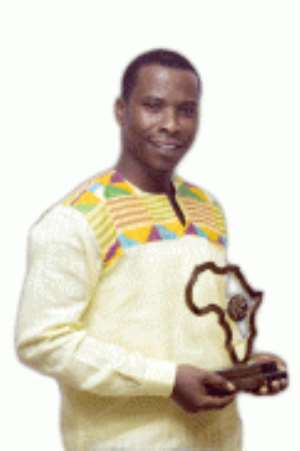 •€Kofi Akpabli shows off his trophy