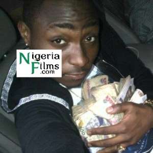 Its Davido Again, Posing with the Cash