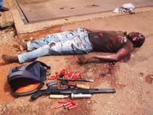 Armed robber on police wanted list dies in hospital