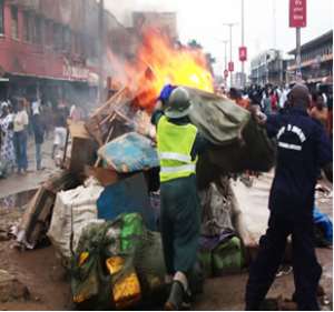 Burning of properties as part of decongestion exercise Credit: Ghanaian Journal