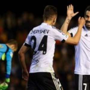 Denis Cheryshev and Alvaro Negredo celebrate after Valencia beat Espanyol on Saturday night.
