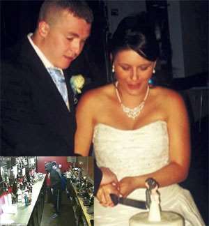 Newly-weds: The couple are pictured cutting their wedding cake at the venue