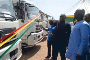 Mr Samuel Ofosu-Ampofo - Minister of Local Government and Rural Development inspecting some of the sanitation trucks.
