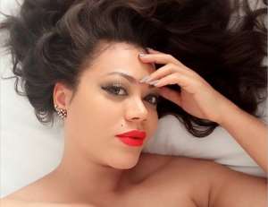 Photo: Nadia Buari shows off twins and possibly, baby daddy