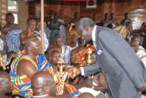 Former President J. A. Kufuor in a handshake with the Asantehene Otumfuo Osei Tutu during a courtesy call on him as part of activites to launch the JAK Foundation