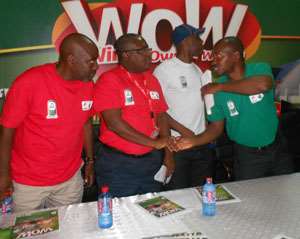 Philip Sowah second from right in a hand shake with Kplorlali Shine Gbologa after the launch