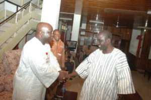 Brong Ahafo Regional Minister, Mr Nyamekye-Marfo R welcoming Graphic MD, Mr Ken Ashigbey L to his office