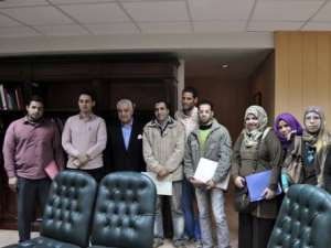 Dr. Zahi Hawass with students after a meeting
