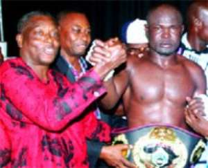 Bukom Banku being decorated after the fight