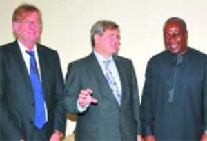 Vice-President John Mahama interacting with  Mr Koos Richelle, Director General of the EU Commission, at his office at the Castle. With them is Ambassador Claude Maerten (left), Head of EU Delegation to Ghana.