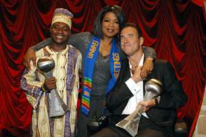 Oprah awards Jim and Emmanuel with the 2005 ESPY Arthur Ashe Courage Award