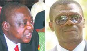 Dr. Benjamin Kumbuor Minister for the Interior (left), Gbevlo Lartey,National Security Cordinator(right)