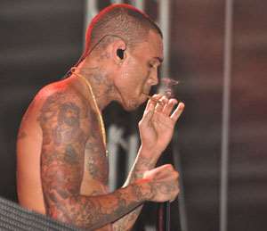 FEEL FREE! RnB singer Chris Brown grabbing a joint of weed at the Accra Sports Stadium
