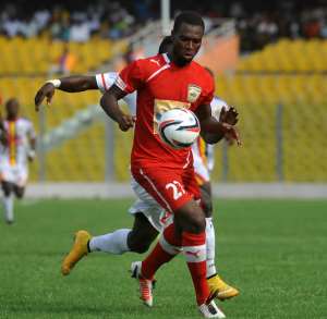 Eric Kumi of Accra Hearts of Oak challenging Smallboy Korbah of Kumasi Asanti Kotoko during the 1st July 2015 Republic day celebration Presidential Cup which is played between Accra Hearts of Oak v Kumasi Asante Kotoko Christian Thompson/BackpagePix