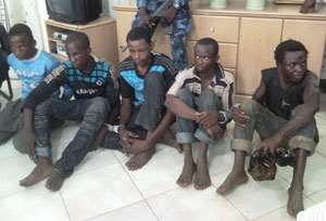 The five suspected robbers Zakari Schwarzenegger (right) who dressed like a woman
