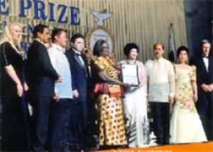 Mrs Chinery-Hesse middle with the officials of Gusi Foundation after receiving her award