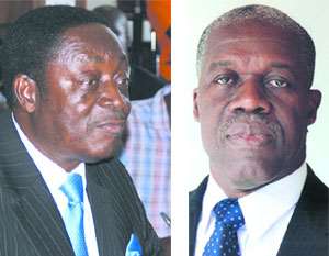 Dr. Kwabena Dufuor - Minister of Finance and Economic Planning (left), Mr. Kwesi Bekoe Amissah-Arthur, Governor Bank of Ghana (right)