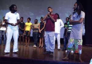 M3nsa (lett) and Wanlov Kubolor (right) with Panji Anoff (middle) producer of the movie on stage after the premier.