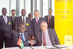 Abdulai Abdul - Rafiu left and Garry Kemp, Senior Vice President of Compliance and Postal Relations, DHL Express at the signing ceremony in Bonn. The two parties signed a Memorandum of Agreement MoU covering a broad range of business activities