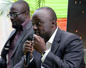 Nana Kwame Sarpong, GM of Yfm left and Ernest Boateng, MD, Global Media Alliance speaking at the press launch