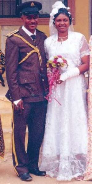 Gbenga and wife on wedding day