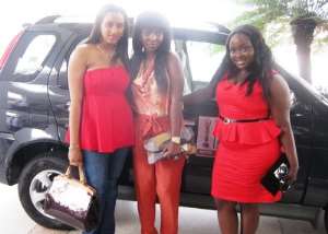Actresses, Juliet Ibrahim Left, Yvonne Okoro Middle and Roselyn Ngissah with the car at the ceremony