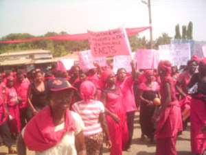 The youth of Vakpo in a demonstration against the siting of the new North Dayi District capital at Anfoega, through principal streets of Vakpo